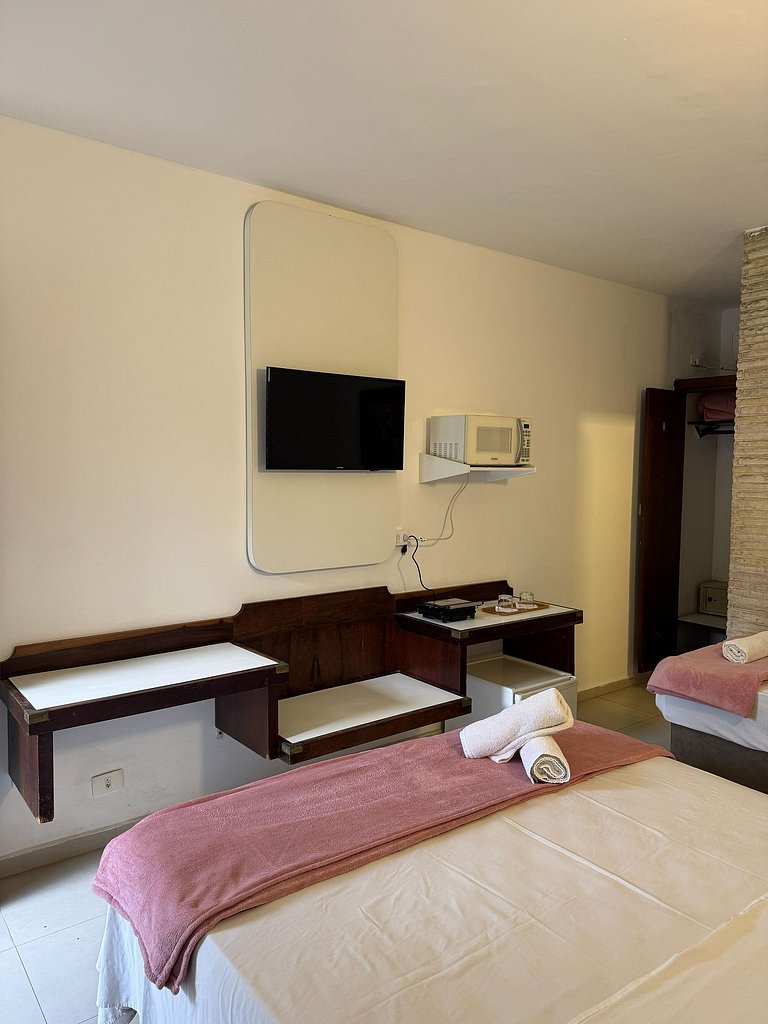 hotel frente ao mar enseada - delphin 214