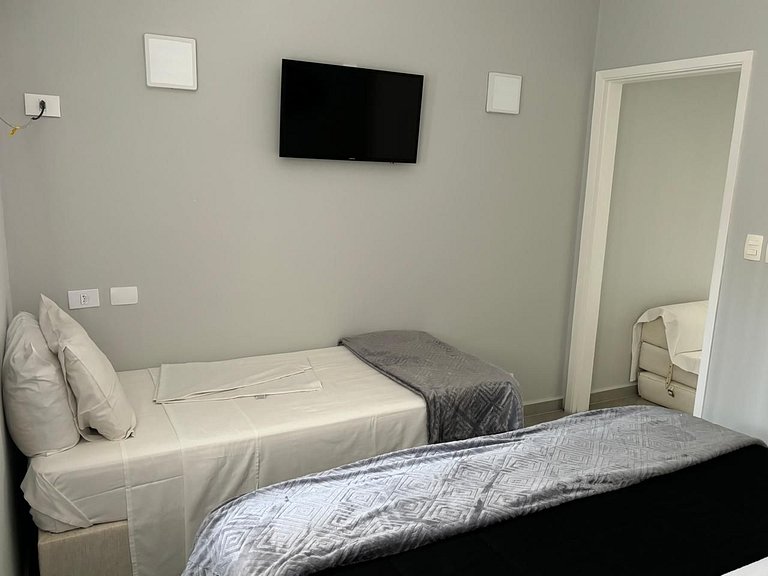 hotel frente ao mar enseada - delphin 217