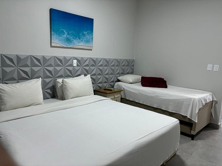hotel frente ao mar enseada - delphin 111